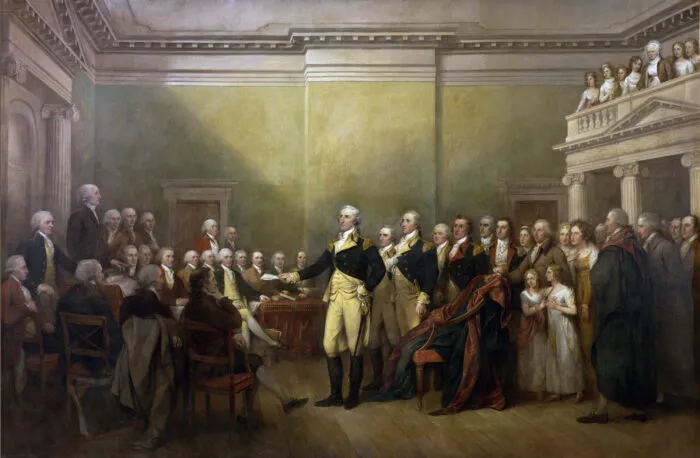 In seiner Abschiedsrede feierte George Washington die amerikanischen Erfolge und lobte die Sache der Freiheit. „General George Washington legt sein Amt nieder“, 1783, von John Trumbull. Foto: gemeinfrei